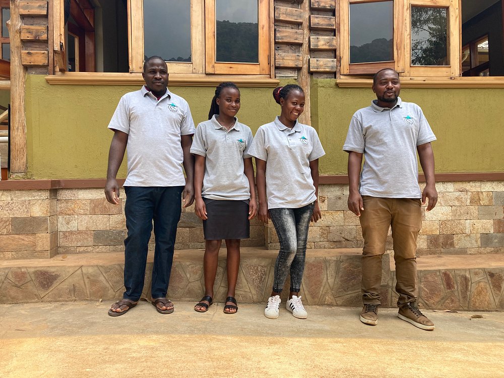 Staff in front of Gorilla Bluff Lodge